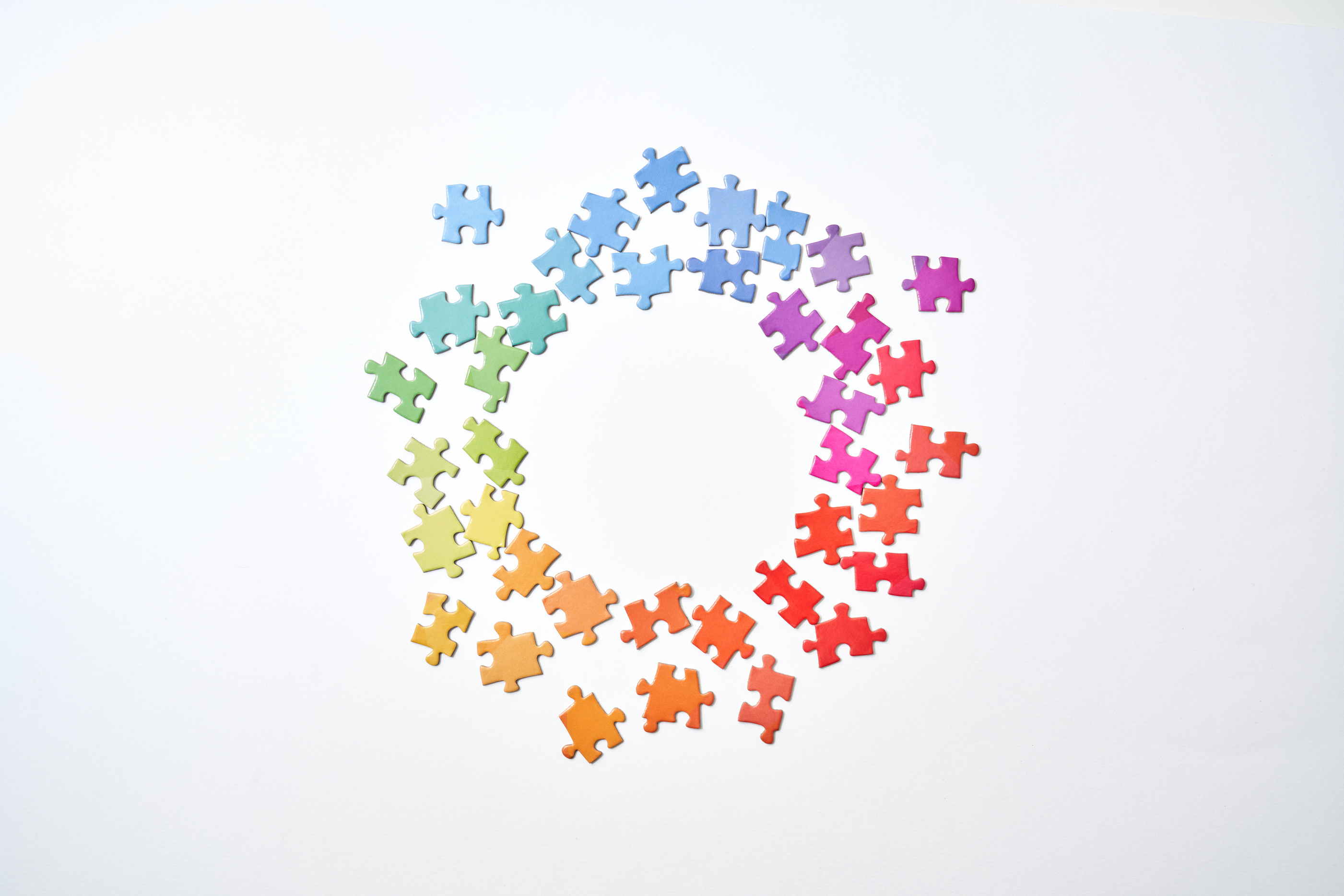 Rainbow Color Puzzle Pieces in a Circle